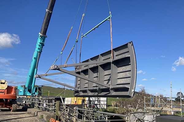 Image of a control gate being installed to a bank