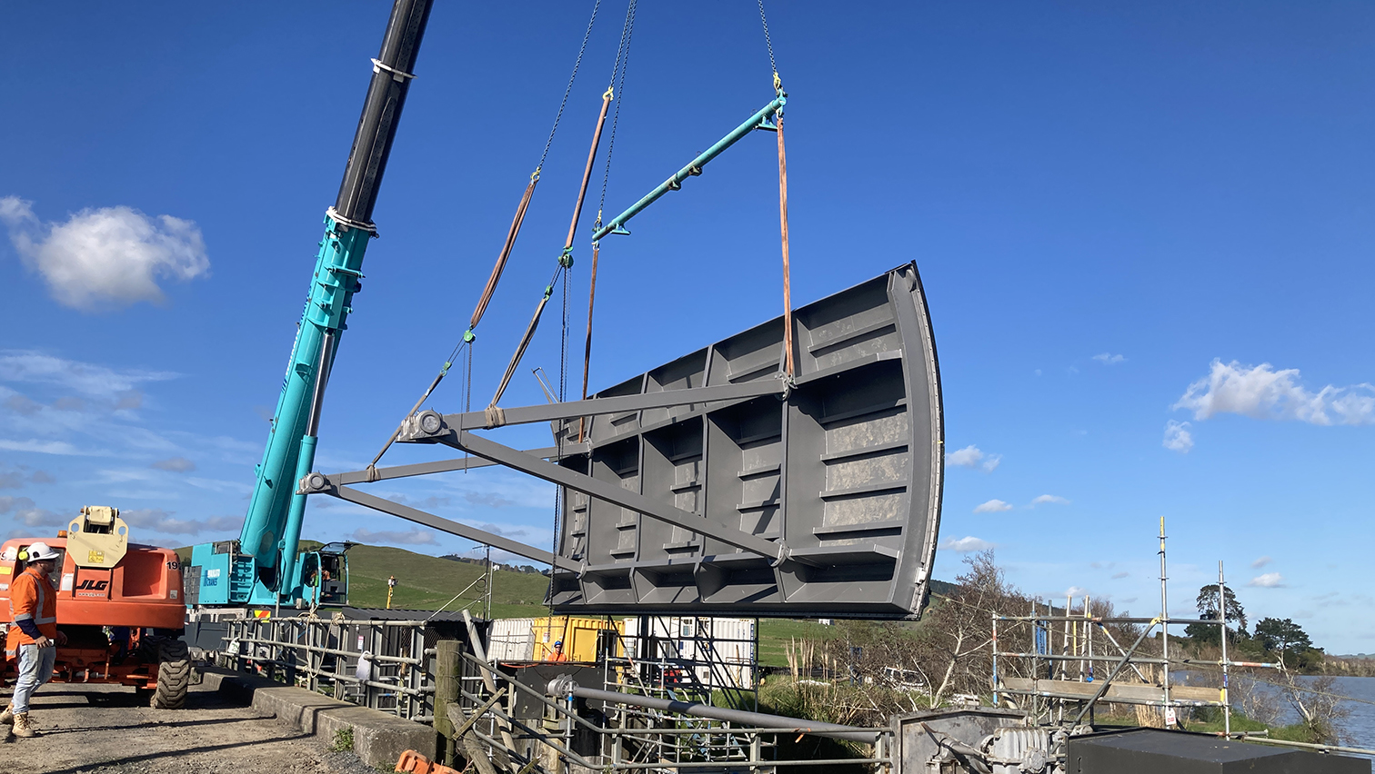 Crain lifting the control gate back into place