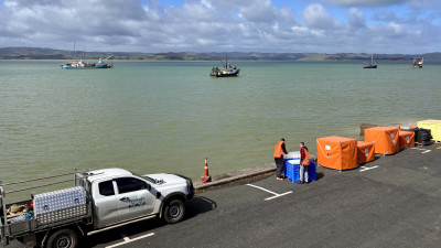 Response equipment and vehicles at the boat ramp during Exercise Kārewa