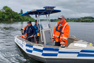 Training exercise for staff in the Harbourmaster vessel on Lake Karapiro