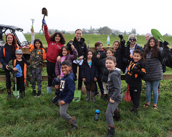 Tamariki from Ōtorohanga Primary School’s rumaki reo (total immersion) class excited for a planting day