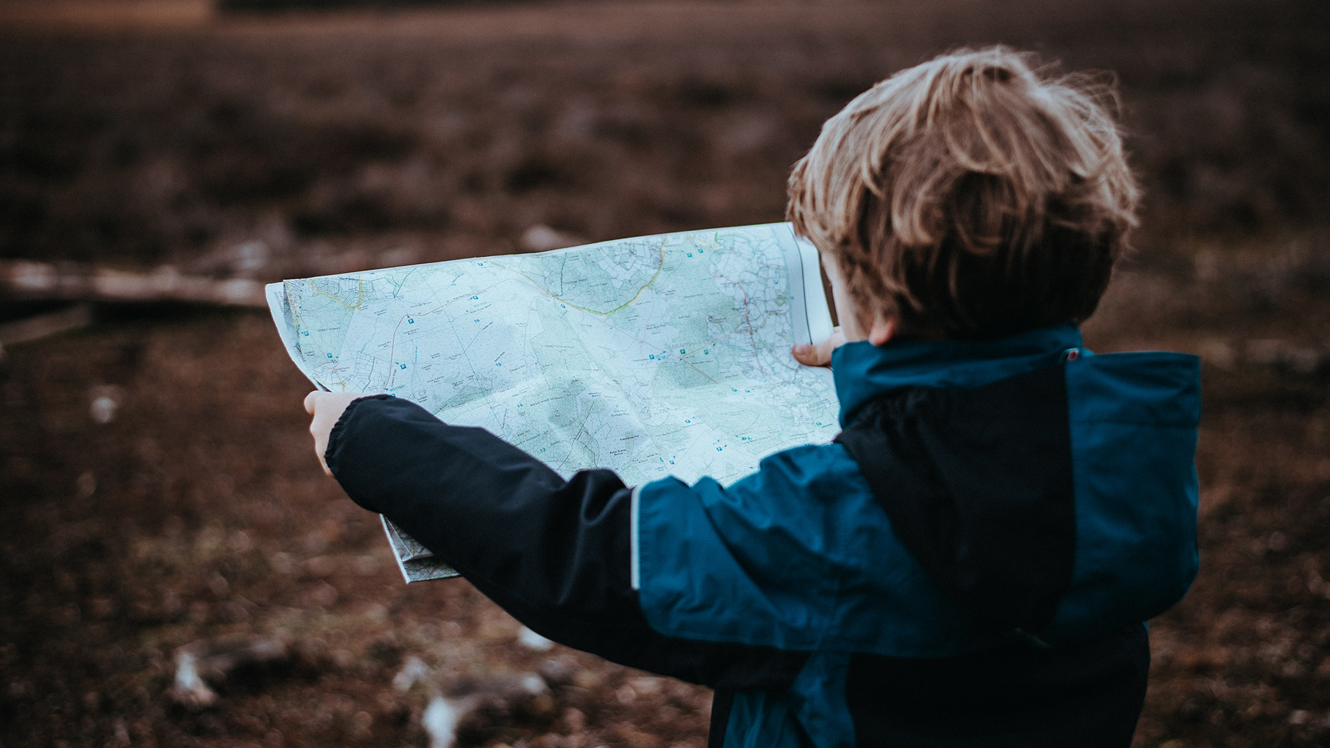 Image - child reading map