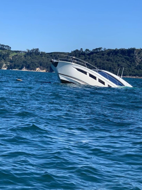 The bow of the sinking vessel as it disappears under the water at Mercury Bay.